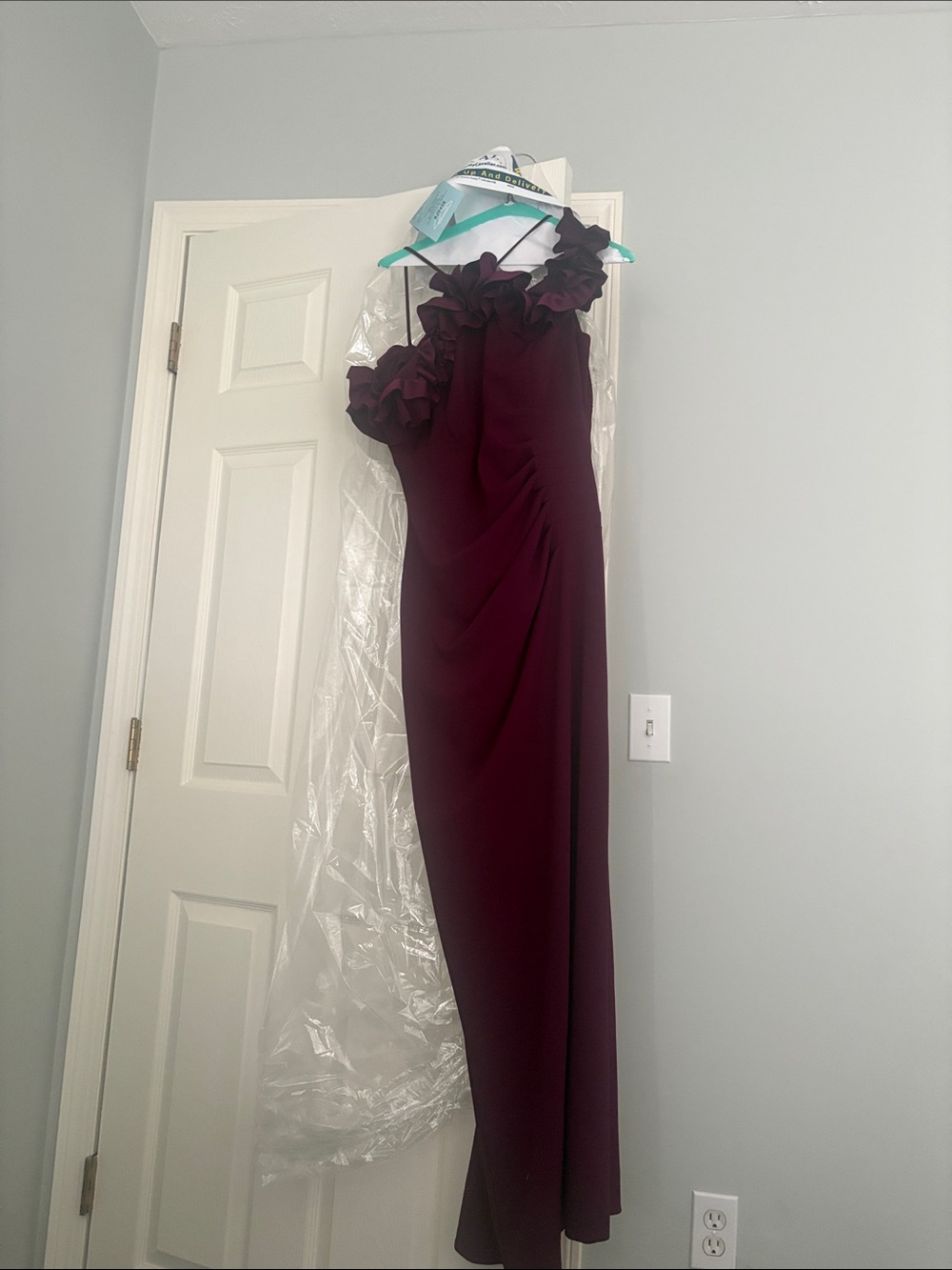 Xscape Elegant Halter-Style Raisin Evening Dress with Ruffle Neckline Detail
